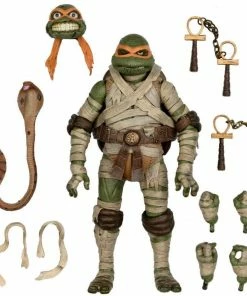 Teenage Mutant Ninja Turtles X Universal Monsters – 7" Action Figurine – Ultimate Michelangelo As The Mummy - NECA Collectibles